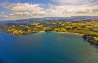 Aerial;Hot_Water_Beach;sandy_beaches;bachs;holiday_homes;blue_sky;blue_sea;bush;