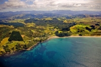 Aerial;Hot_Water_Beach;sandy_beaches;bachs;holiday_homes;blue_sky;blue_sea;bush;