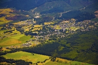Aerial;Hanmer_Springs;green_fields;paddocks;brown_hills;hills;mountains;blue_sky