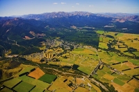Hanmer_Springs;Aerial;green_fields;paddocks;brown_hills;hills;mountains;blue_sky
