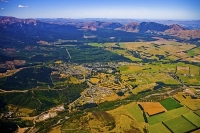 Hanmer_Springs;Aerial;green_fields;paddocks;brown_hills;hills;mountains;blue_sky