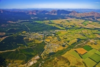 Aerial;Hanmer_Springs;green_fields;paddocks;brown_hills;hills;mountains;blue_sky