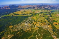 Aerial;Hanmer_Springs;green_fields;paddocks;brown_hills;hills;mountains;blue_sky