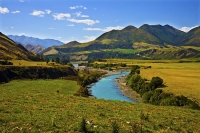 Hanmer_Springs;green_fields;paddocks;brown_hills;hills;mountains;blue_sky;Hanmer