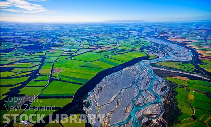 Aerial;Waimakariri River;Canterbury;mountains;hills;Canterbury Plain;North Canterbury;green fields;paddocks;green paddocks;rivers;Eyre River;Waimakariri river;dairy farming;sheep;Kowai Bush