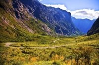 Road_to_Milford_Sound;Fiordland;mountains;hills;rivers;Road;State_Highway_94;bus
