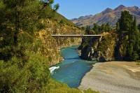 Hanmer_Springs;green_fields;paddocks;brown_hills;hills;mountains;blue_sky;Hanmer