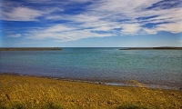 Palliser_Bay;Wairarapa;rocky_shoreline;coast_road;blue_sky;blue_sea;bluffs;cliff