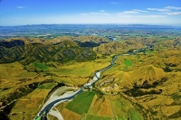 Waiau_River;Hanmer_Springs;green_fields;paddocks;brown_hills;hills;mountains;blu