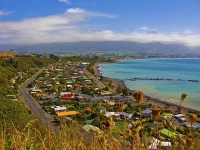 Kaikoura_esplanade;Kaikoura;Kaikoura_Peninsula;seaward_Kaikoura_Range;green_fiel